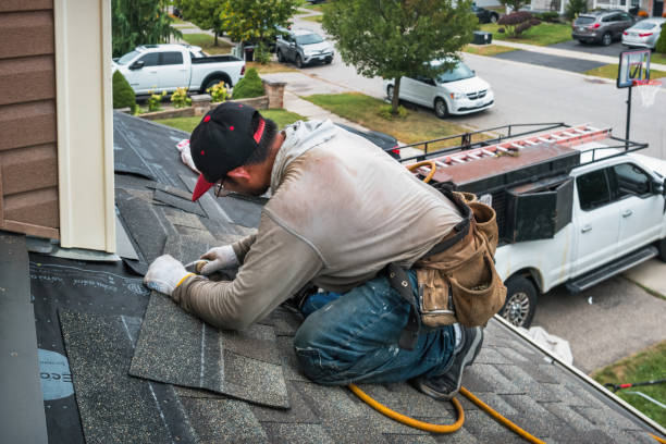 Professional Emergency Roof Repair technician working in Greenville, NH
